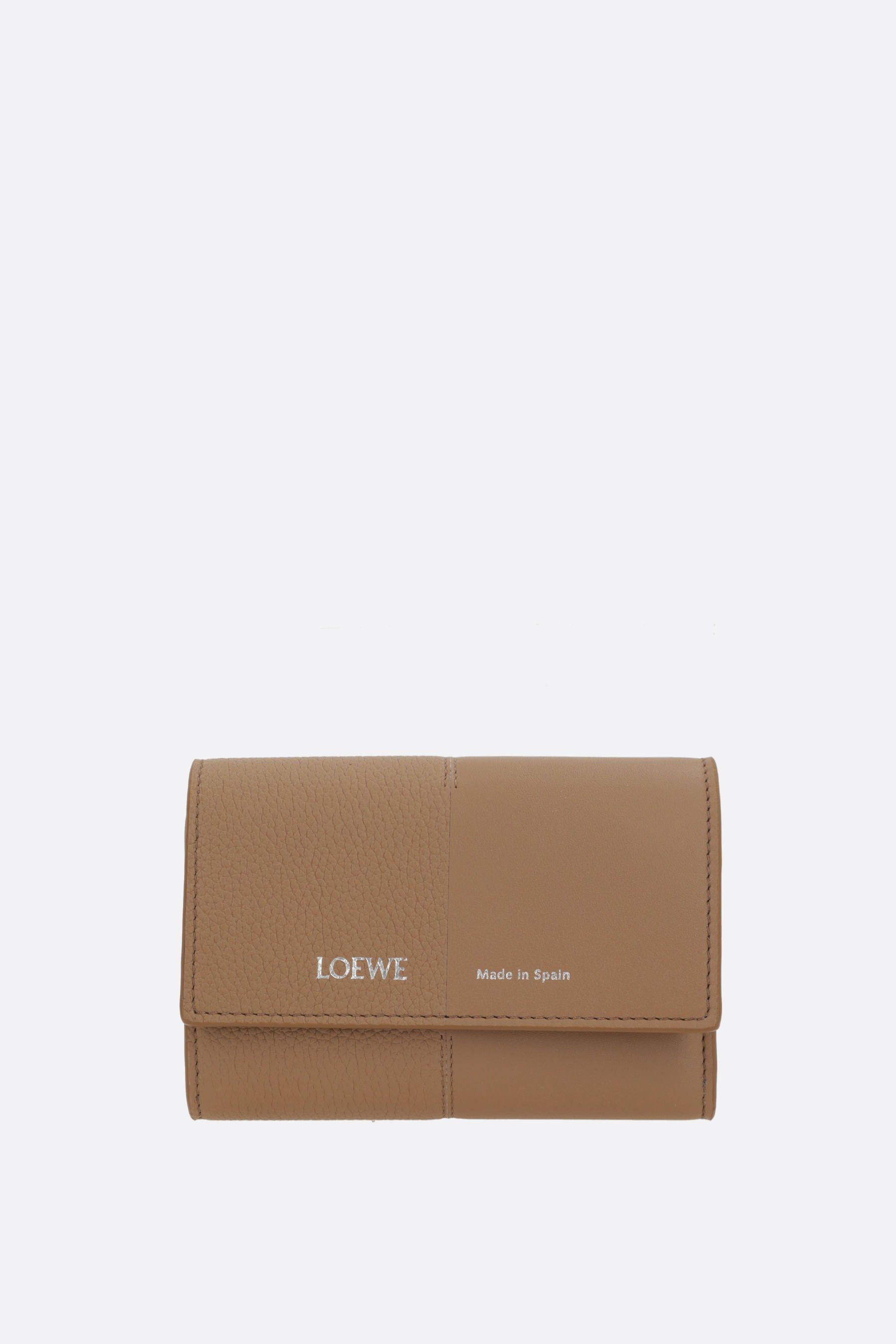 small vertical wallet in smooth and grained leather