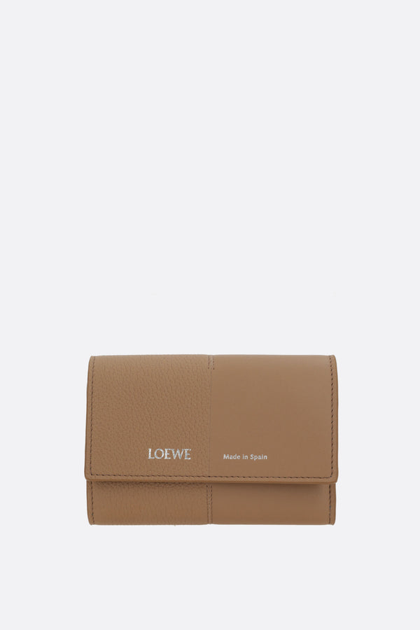 small vertical wallet in smooth and grained leather