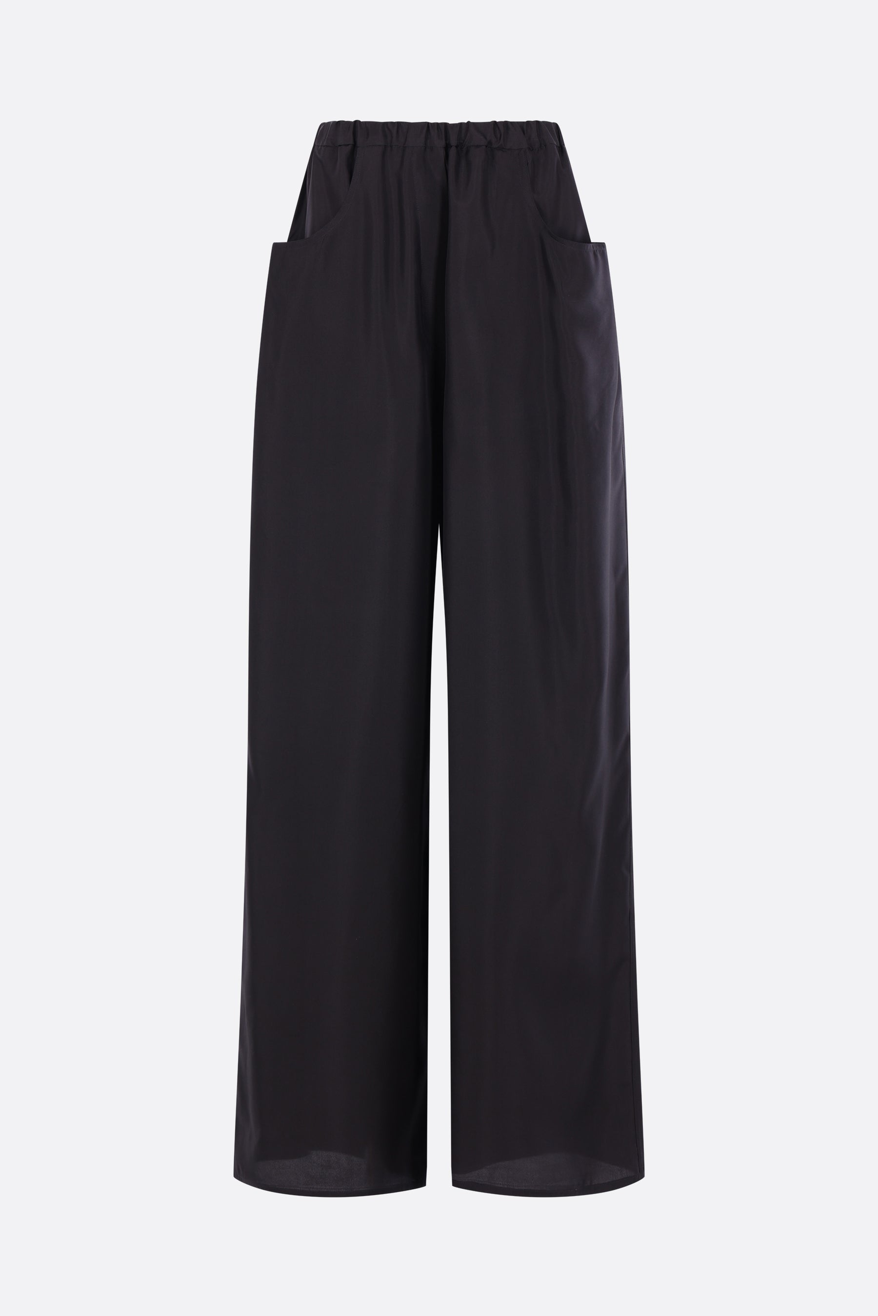 Over trousers in silk