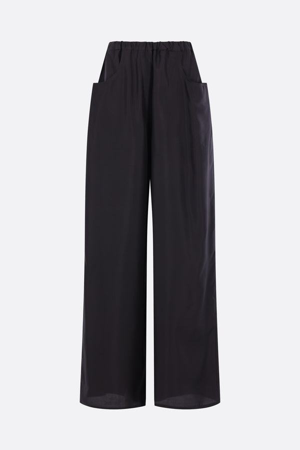 Over trousers in silk