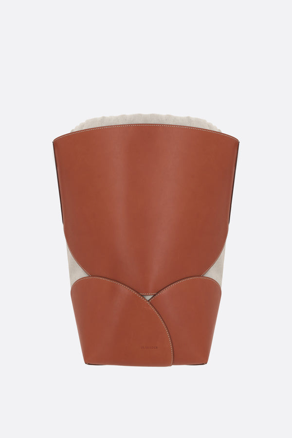borsa a secchiello Curve media in pelle liscia e canvas