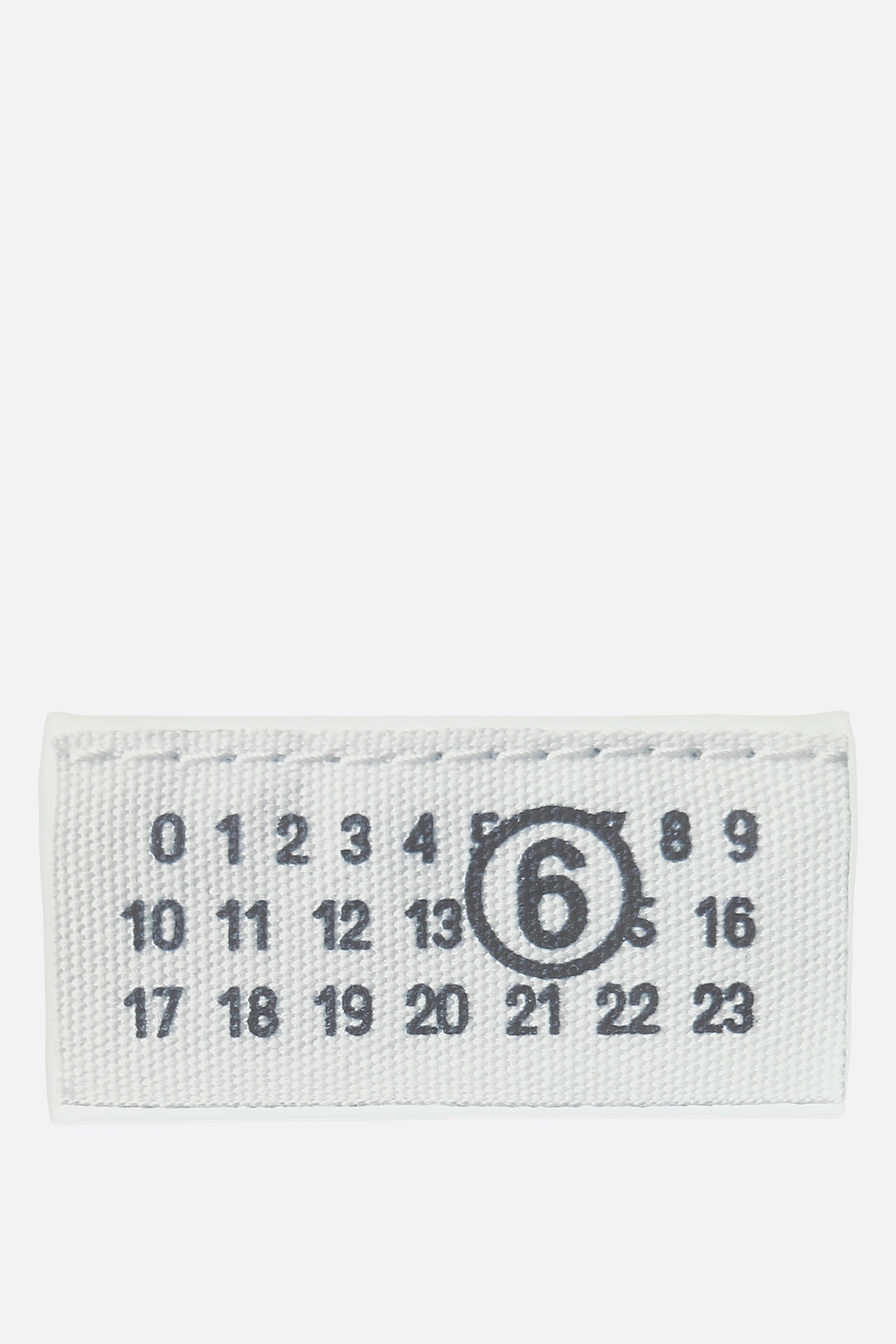 Numeric label clutch in eco-leather