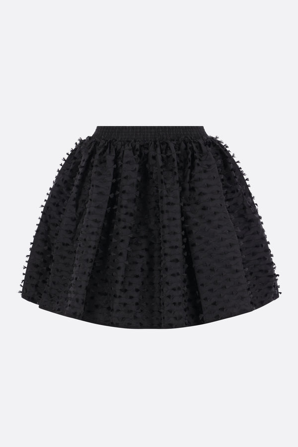 Dallas mini skirt in Fiamma fil-coupé
